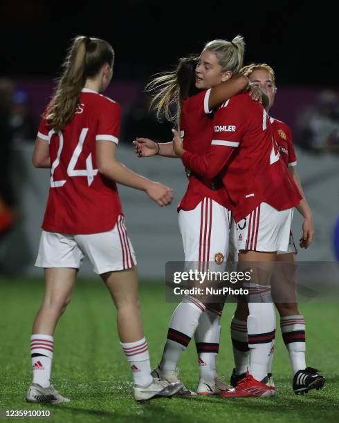 Manchester United Ivana Fuso celebrates with Alessia Russo after scoring their first goal during the FA Women's Continental League Cup match between...