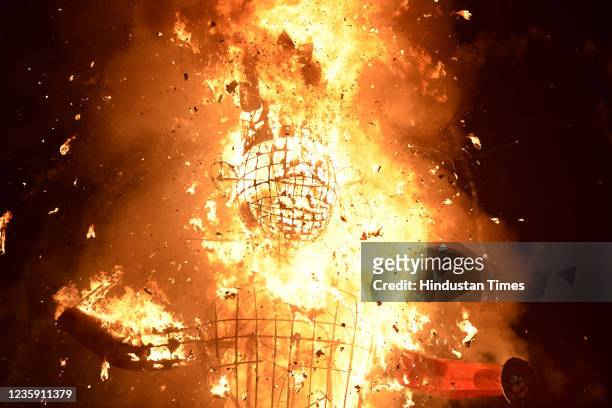 An effigy of Hindu mythical character Ravana being burnt during the Dussehra Celebrations at Noida Stadium in Sector 21A, on October 15, 2021 in...