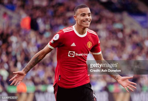 Mason Greenwood of Manchester United celebrates scoring a goal to make the score 0-1 during the Premier League match between Leicester City and...