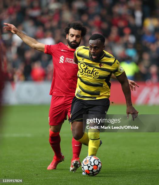 Danny Rose of Watford gets away from Mohamed Salah of Liverpool during the Premier League match between Watford and Liverpool at Vicarage Road on...