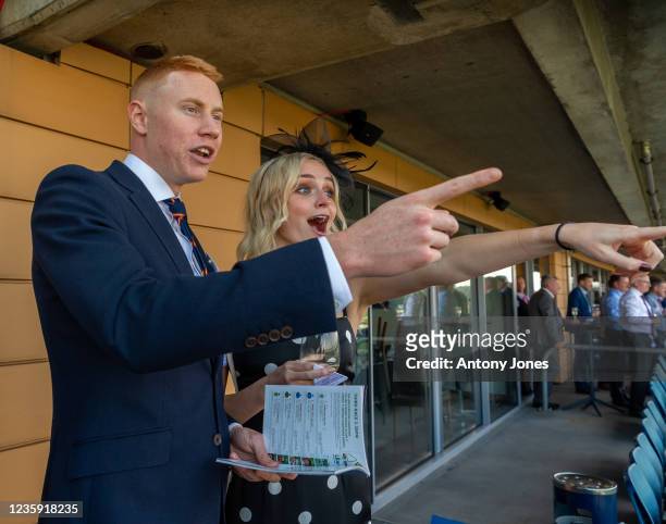 Tom Dean and Catherine Ross attend the QIPCO British Champions Day at Ascot Racecourse on October 16, 2021 in Ascot, England.