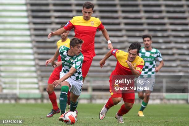 Goncalo Franco of Moreirense FC competes for the ball with Joao Pinto and Bandeira of Oriental Dragon FC ,during the Portuguese Cup match between...