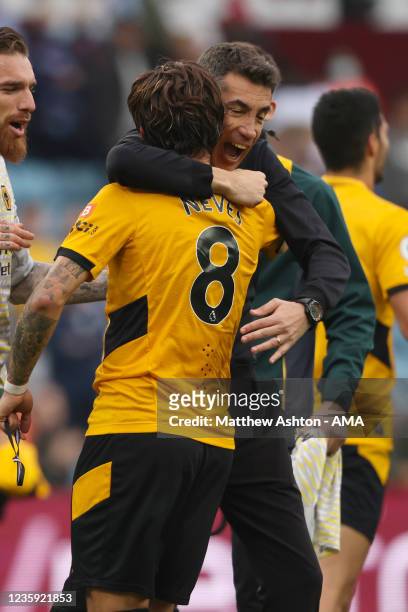 Bruno Lage the head coach / manager of Wolverhampon Wanderers celebrates with scorer of the winning goal Ruben Neves during the Premier League match...