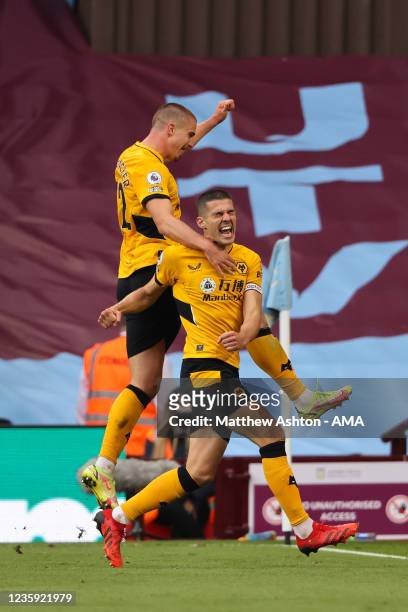 Conor Coady of Wolverhampton Wanderers celebrates after scoring a goal to make it 2-2 during the Premier League match between Aston Villa and...