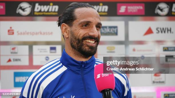 Adriano Grimaldi of 1.FC Saarbruecken gives an interview after the 3. Liga match between Hallescher FC and 1. FC Saarbrücken at Erdgas-Sportpark on...