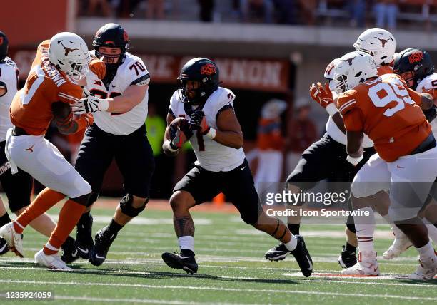 Oklahoma State Cowboys running back Jaylen Warren runs the ball during the game against the University of Texas during the game on October 16 at...