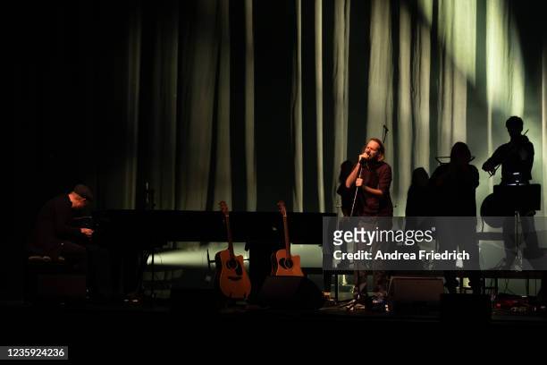 Kai Schumacher, Gisbert zu Knyphausen and an ensemble perform live on stage during a concert at the Admiralspalast on October 16, 2021 in Berlin,...