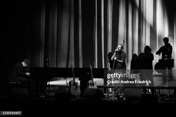 Kai Schumacher and Gisbert zu Knyphausen perform live on stage during a concert at the Admiralspalast on October 16, 2021 in Berlin, Germany.