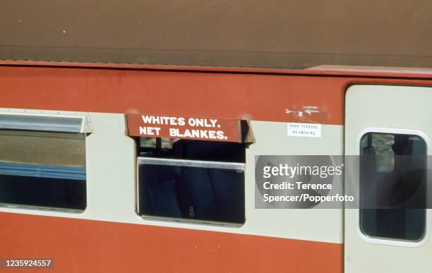 Sign that reads "Whites Only" on a train carriage in Muizenberg, South Africa during Apartheid, circa 1970