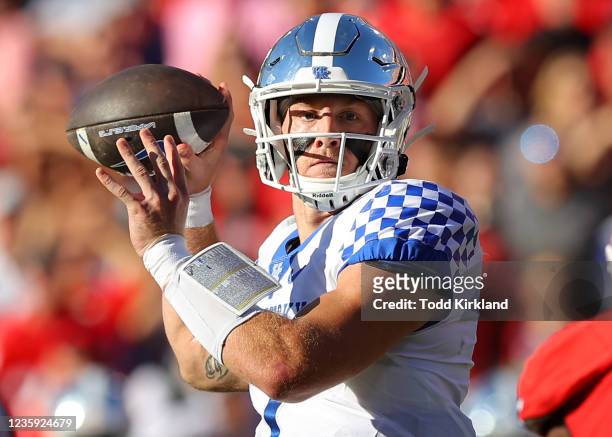Will Levis of the Kentucky Wildcats looks to pass in the first half against the Georgia Bulldogs at Sanford Stadium on October 16, 2021 in Athens,...
