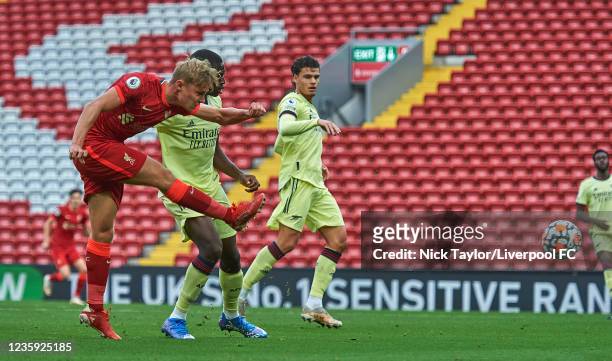 Paul Glatzel of Liverpool and Mazeed Ogungbo of Arsenal in action during the PL2 game at Anfield on October 16, 2021 in Liverpool, England.