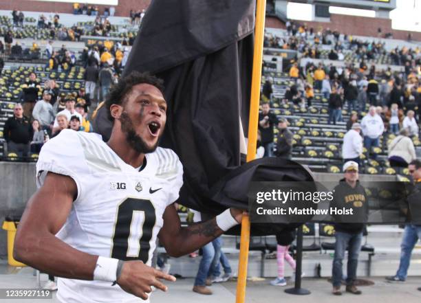 Wide receiver Milton Wright of the Purdue Boilermakers plants a flag in the end zone following the match-up against the Iowa Hawkeyes at Kinnick...