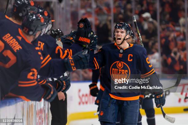 Connor McDavid of the Edmonton Oilers celebrates a goal against the Calgary Flames during the first period at Rogers Place on October 16, 2021 in...