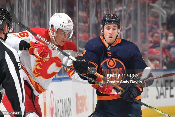 Kyle Turris of the Edmonton Oilers skates during the first period in the game battles for the puck against Nikita Zadorov of the Calgary Flames on...