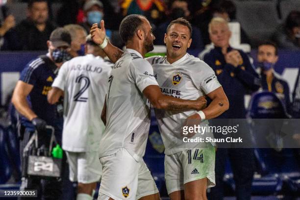 Javier Hernandez of Los Angeles Galaxy celebrates his goal with Victor Vazquez during the game against Portland Timbers at the Dignity Health Sports...