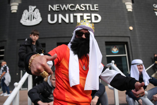 Fans of Newcastle United wearing traditional Saudi head dress following the ownership takeover by a the Saudi Arabia Public Investment Fund ahead of...