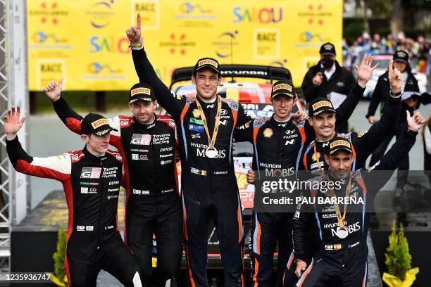 Second-placed Britain's driver Elfyn Evans and co-driver Scott Martin of Toyota Gazoo Racing WR, winners Belgium's Thierry Neuville and co-driver...