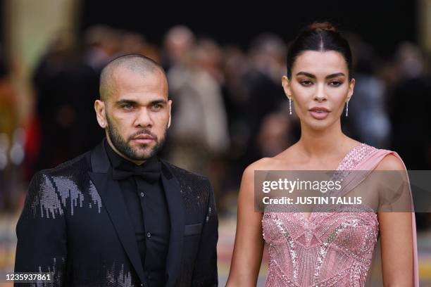 Brazilian footballer Dani Alves and his wife Joana Sanz arrive on the green carpet to attend the inaugural Earthshot Prize awards ceremony at...