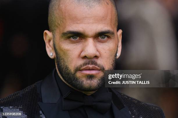 Brazilian footballer Dani Alves arrives on the green carpet to attend the inaugural Earthshot Prize awards ceremony at Alexandra Palace in London on...