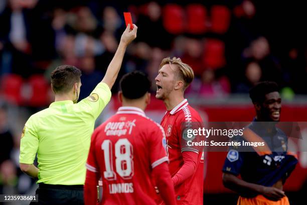 Referee Jochem Kamphuis gives a red card during the Dutch Eredivisie match between Fc Twente v Willem II at the De Grolsch Veste on October 17, 2021...