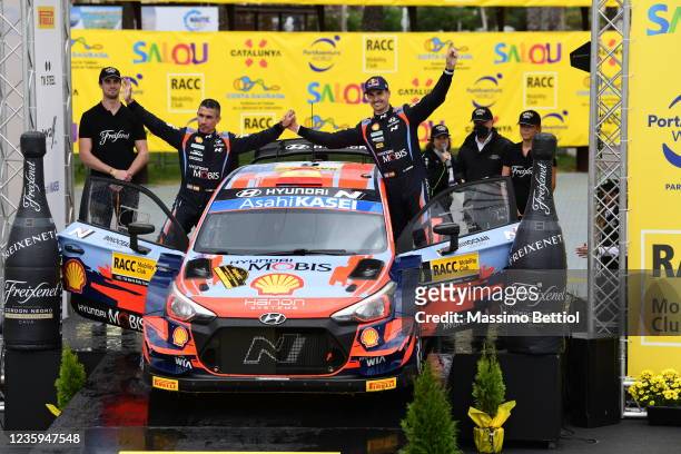 Dani Sordo of Spain and Candido Carrera of Spain celebrate their third postion in the final overall during Day Four of the FIA World Rally...