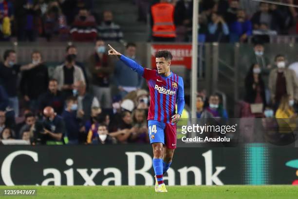 Barcelona's midfielder Philippe Coutinho celebrates his goal during the Spanish league football match between FC Barcelona and Valencia CF at the...