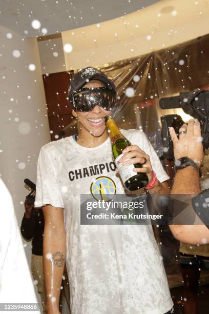 Candace Parker of the Chicago Sky celebrates after winning Game Four of the 2021 WNBA Finals against the Phoenix Mercury on October 17, 2021 at the...