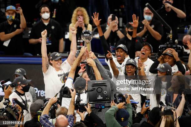 The Chicago Sky celebrate after winning Game Four of the 2021 WNBA Finals against the Phoenix Mercury on October 17, 2021 at the Wintrust Arena in...