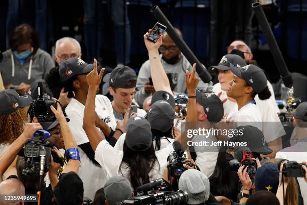 The Chicago Sky celebrate after winning Game Four of the 2021 WNBA Finals against the Phoenix Mercury on October 17, 2021 at the Wintrust Arena in...