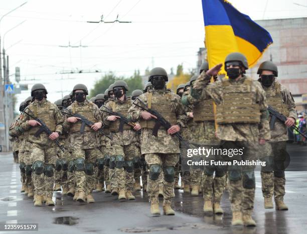 XD;&#xA;Servicemen march during the first military parade on the Defenders and Defenderesses of Ukraine Day and on the occasion the 30th anniversary...