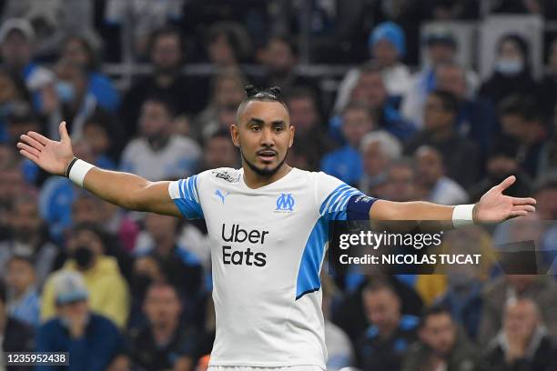 Marseille's French midfielder Dimitri Payet gestures during the French L1 football match between Olympique de Marseille and FC Lorient at Stade...