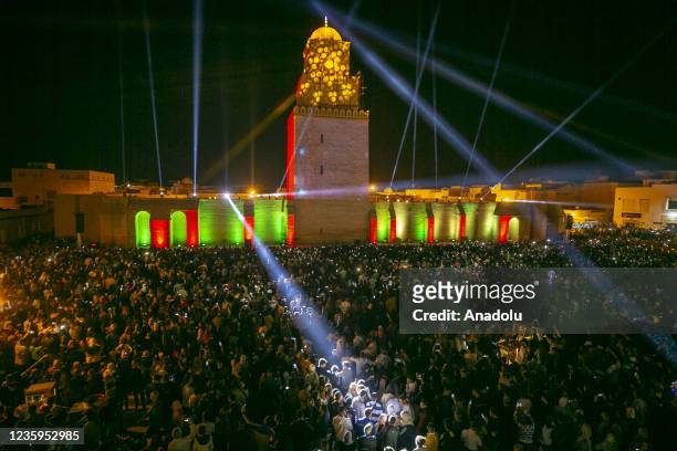Muslims gather at Mosque of Uqba to attend events of Mawlid al-Nabi in Kairouan, Tunisia on October 18, 2021.