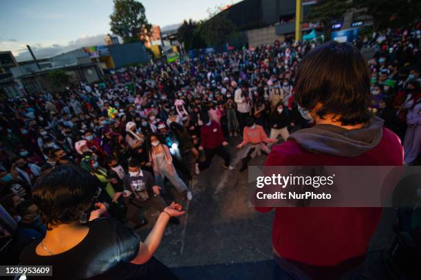 Pop music fans dance at a stage during the fourth day of the SOFA 2021, a fair aimed to the geek audience in Colombia that mixes Cosplay, gaming,...