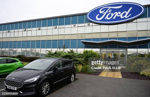 Picture shows the Ford logo at the company's Halewood plant in Liverpool, north west England, on October 18, 2021. - US auto giant Ford on October 18...