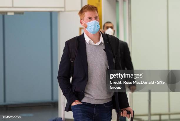 Adam Bogdan is pictured as Ferencvaros arrive at Glasgow Airport on October 18 in Glasgow, Scotland.
