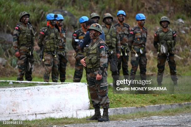 Indian Army soldiers stand after displaying their skills at Gacham in Arunachal Pradesh on October 18, 2021.