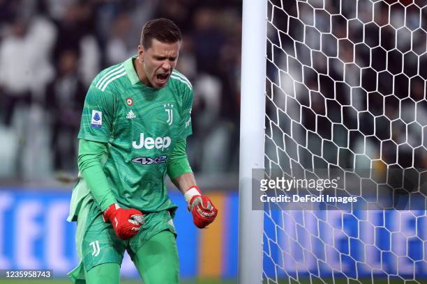 Wojciech Szczesny of Juventus FC celebrates after a saved penalty during the Serie A match between Juventus and AS Roma at Juventus Stadium on...