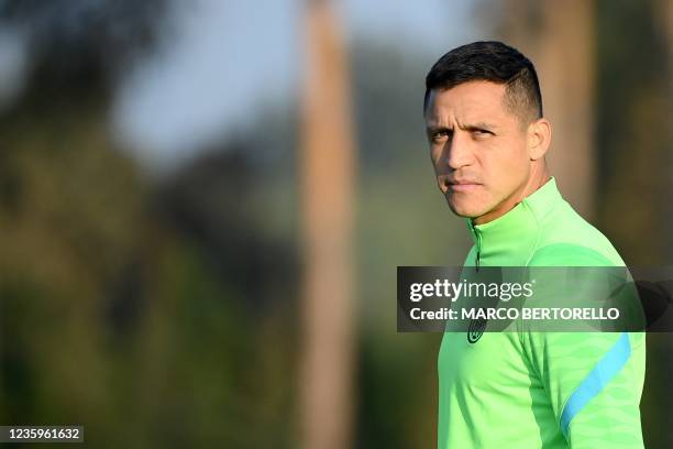 Inter Milans forward Alexis Sanchez from Chile looks on during a training session on the eve of the UEFA Champions League Group D football match...
