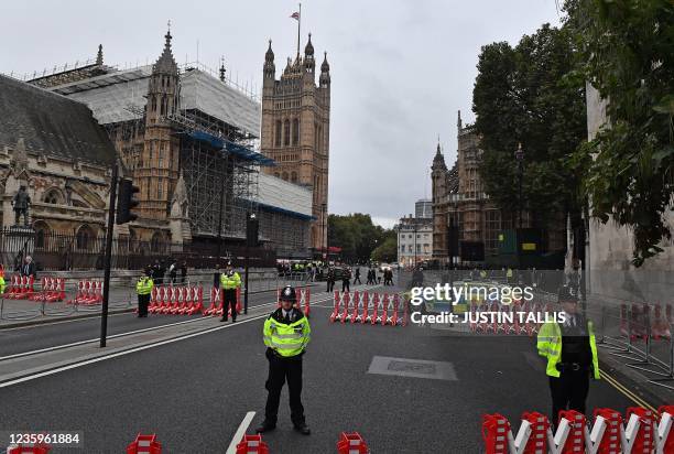 Members of Parliament walk from the Houses of Parliament to attend a service to pay tribute to slain British lawmaker David Amess, St Margaret's...
