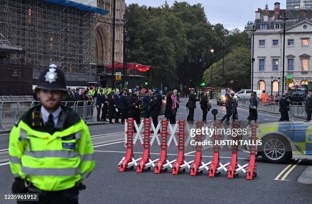 Members of Parliament walk from the Houses of Parliament to attend a service to pay tribute to slain British lawmaker David Amess, St Margaret's...