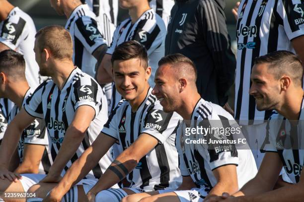 Paulo Dybala of Juventus and Arthur of Juventus during the Juventus official team photo at JTC on October 18, 2021 in Turin, Italy.