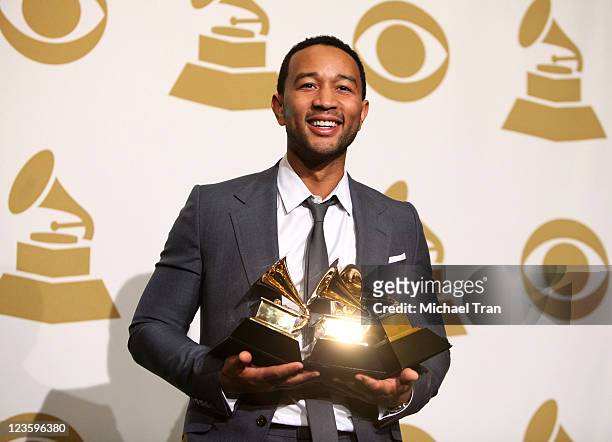 Singer John Legend poses in the press room at The 53rd Annual GRAMMY Awards held at Staples Center on February 13, 2011 in Los Angeles, California.