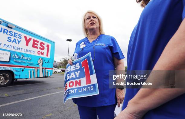 Somerville, MA Donna Kelly-Williams, president of the Massachusetts Nurses Association, chats following a nurses rally near Partners HealthCare in...