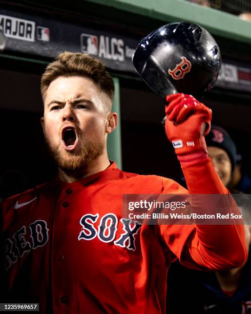 Christian Arroyo of the Boston Red Sox reacts after hitting a two-run home run during the third inning of game three of the 2021 American League...