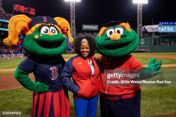 Boston mayor Kim Janey poses for a photograph with mascots Wally and Tessie before game three of the 2021 American League Championship Series between...