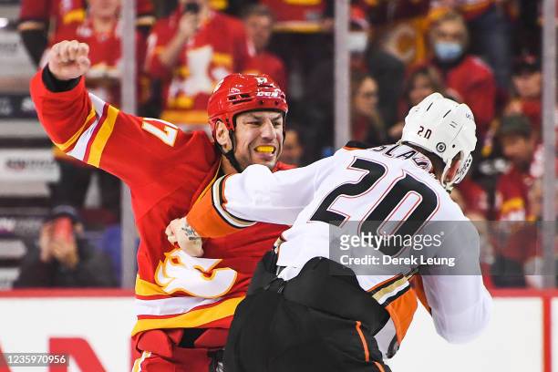 Milan Lucic of the Calgary Flames fights Nicolas Deslauriers of the Anaheim Ducks during an NHL game at Scotiabank Saddledome on October 18, 2021 in...