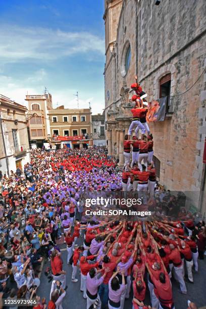 The Castellers of the Nens del Vendrell group raise a human tower during the Santa Teresa Festival in Vendrell. Since the 18th century, Catalonia's...