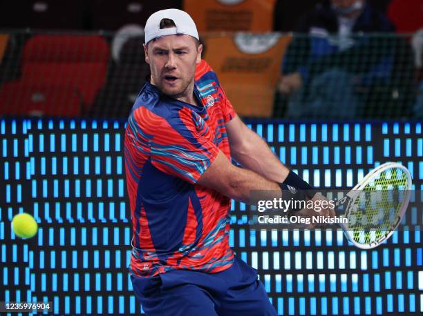 Illya Marchenko of Ukraine plays a shot against Alexander Bublik of Kazakhstan during on Day Two of the VTB Kremlin Cup on the Central Court of the...