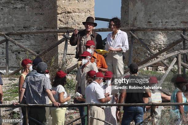 Harrison Ford and Phoebe Waller-Bridge are seen during Indiana Jones 5 Filming In Sicily, on October 19, 2021 in Temple of Segesta, Sicily, Italy.