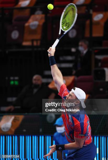 Illya Marchenko of Ukraine plays a shot against Alexander Bublik of Kazakhstan during on Day Two of the VTB Kremlin Cup on the Central Court of the...